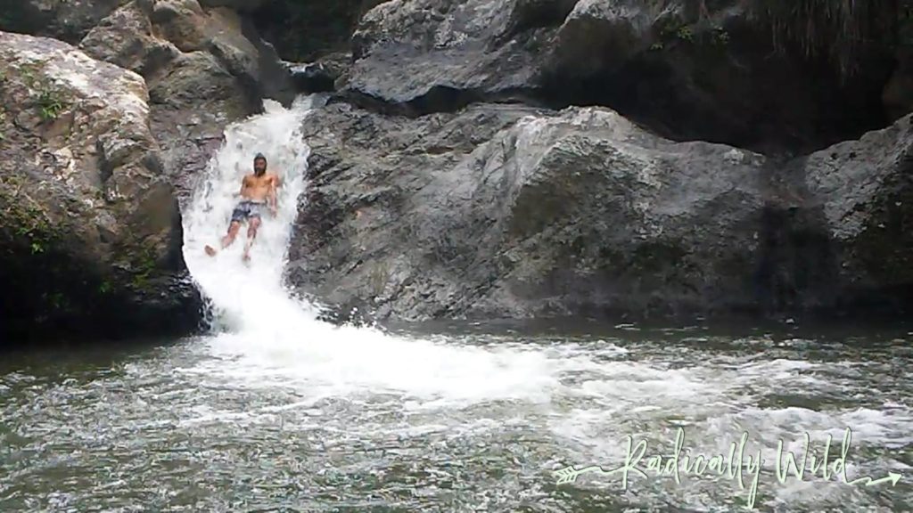 sliding down a waterfall