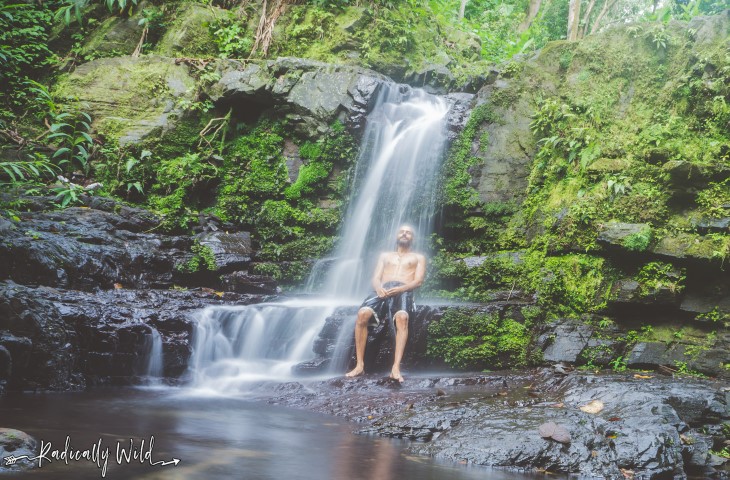Shwoer meditation under a waterfall in puerto rico is paradise