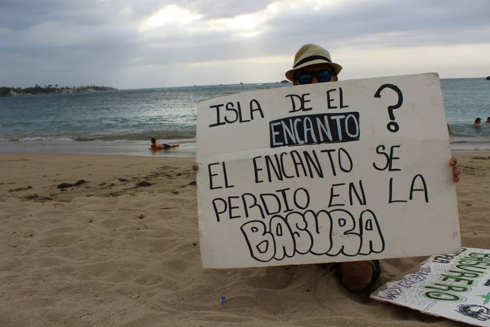isladelencanto1 guardian beach cleanup Puerto Rico sign on shore